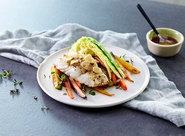 Oven-baked skrei with butter sauce and oxheart cabbage