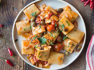 Pasta with Norwegian stockfish and puttanesca sauce
