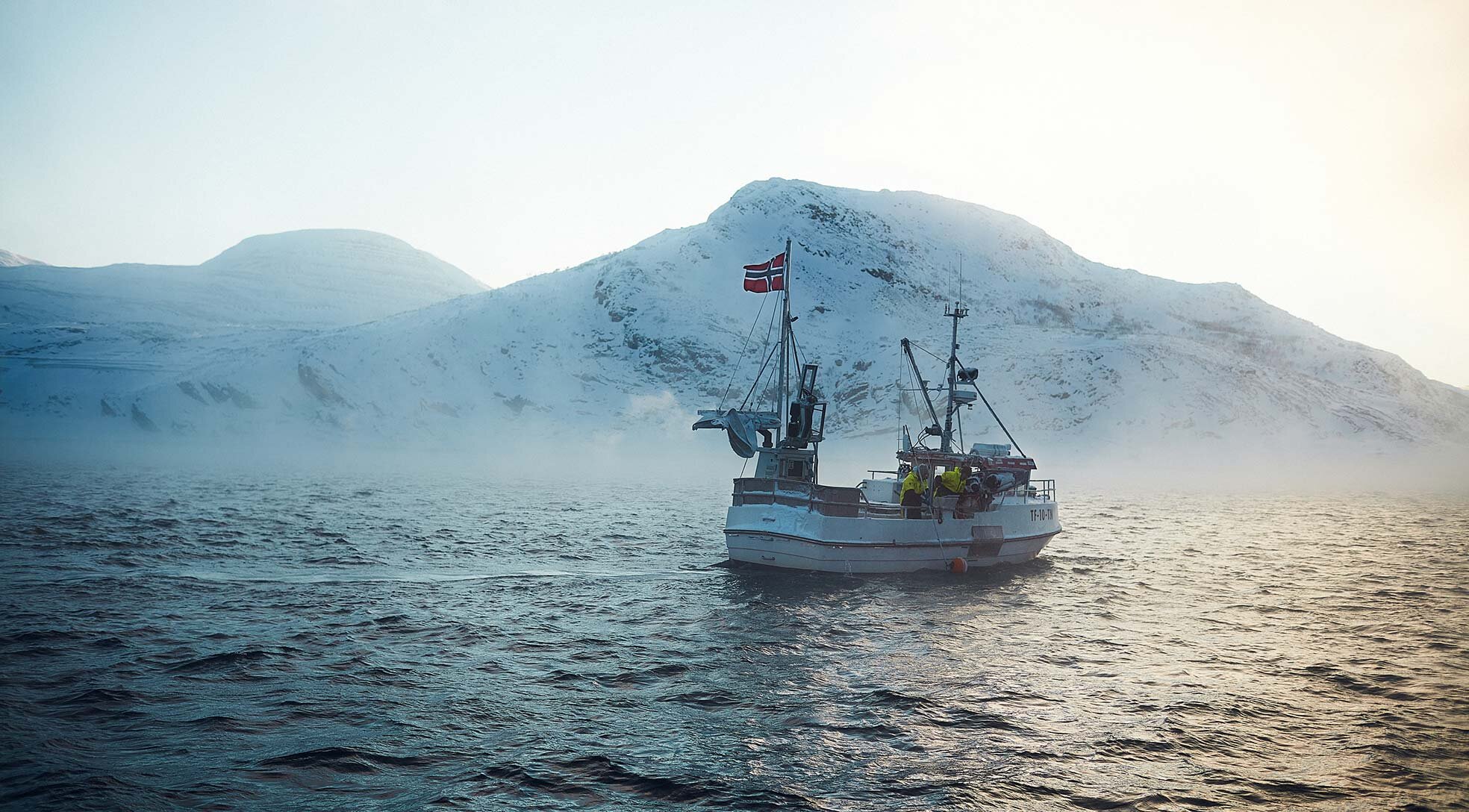 Fishing boat heading out to sea